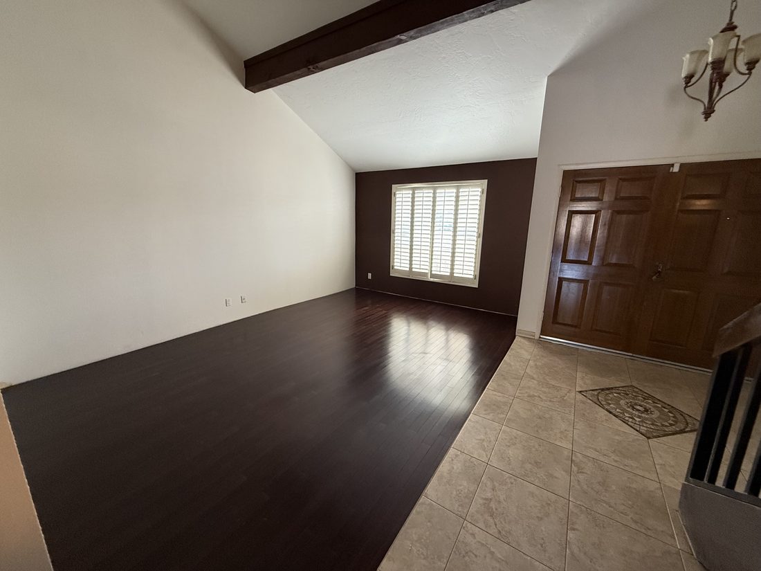An empty living room in a vacant house Honeybird Homes purchased.
